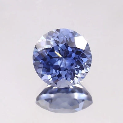 Paste Blue Color Sapphire gemstone on a light gray background