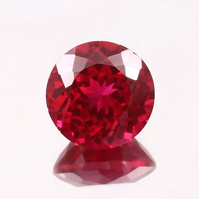 Rare Pigeon Red Ruby gemstone on a white background