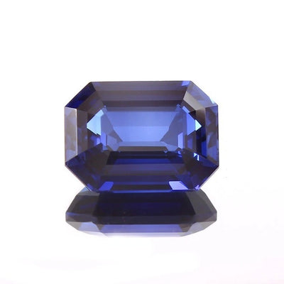 Ceylon Blue Sapphire gemstone with a rectangular cut on a white background