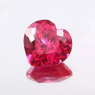 Heart-shaped Pink Ruby gemstone on a clear background