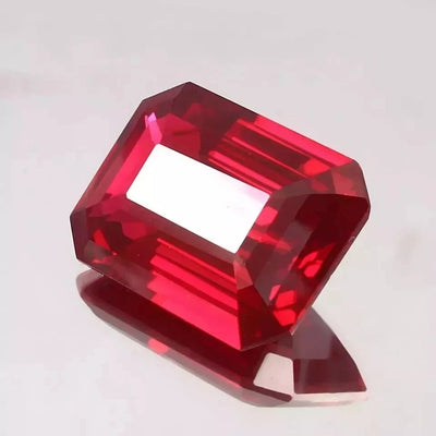 Red Mozambique Ruby gemstone on a white background