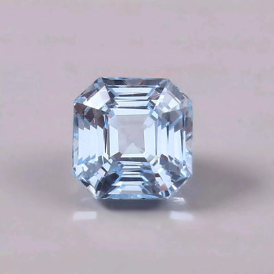 Clear Sky Blue Color Aquamarinegemstone on a light gray background